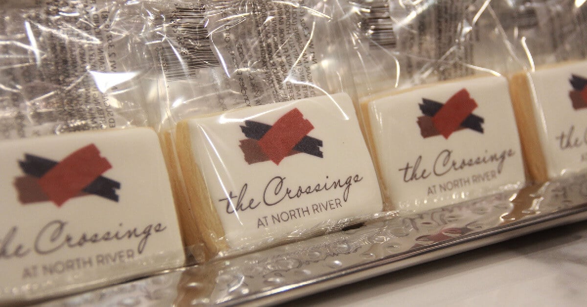 individually wrapped cookies featuring the logo for The Crossings at North River