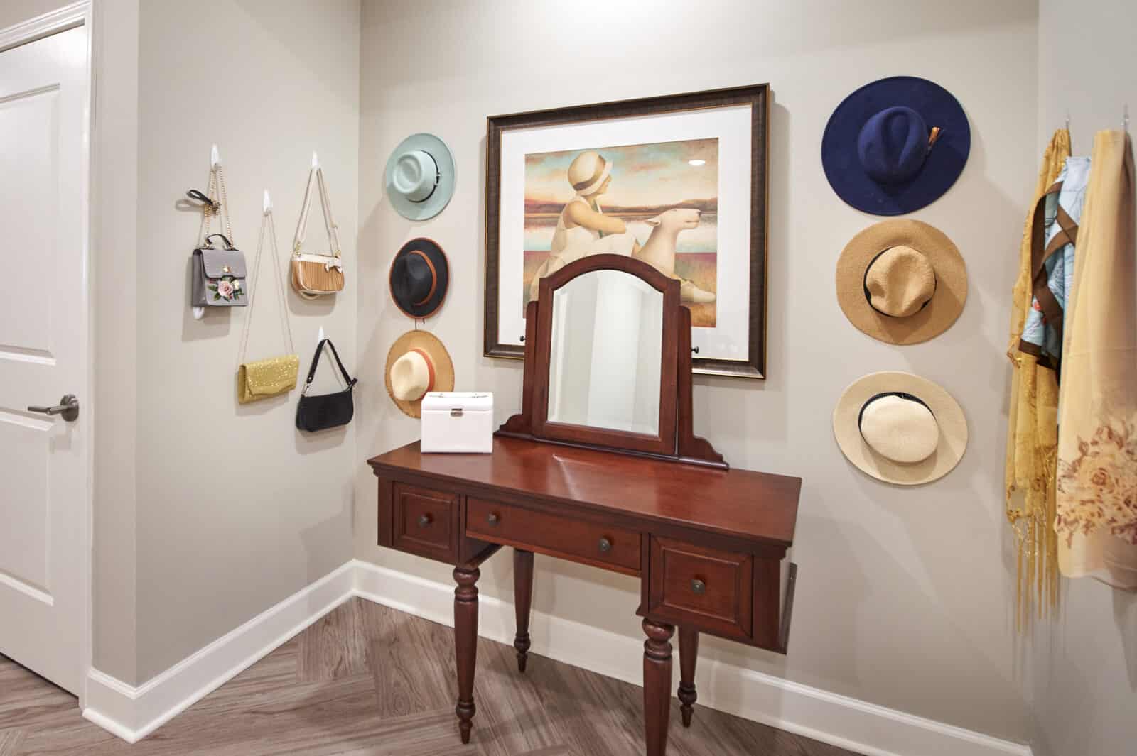 mirrored dressing station with hats on hung on the wall